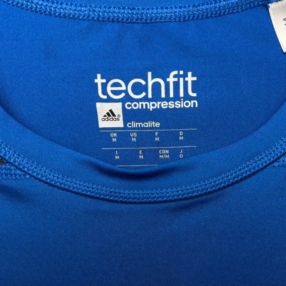 ADIDAS TECHFIT COMPRESSION CLIMALITE‎ BLUE AND BLACK CUT OFF SLEEVE SHIRT
